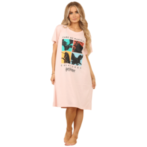 Model wearing light pink Harry Potter nightdress with Magical Creatures design