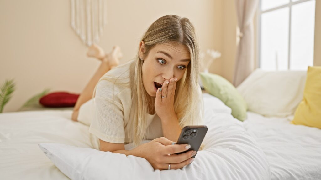 Surprised woman after seeing spring pyjama discounts